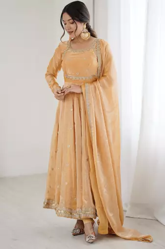 Light orangeelegant fandy silk gown set with sequins coding work, pant & dupatta