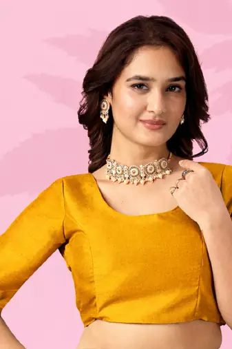 mustard yellow art silk saree with hand embroidery & sequin detailing