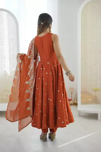 orange roman silk salwar suit with embroidery work