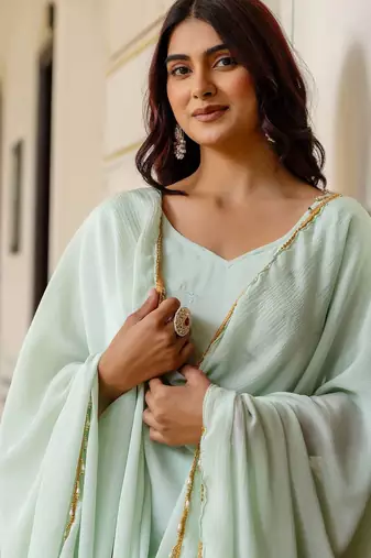 mint green chinnon silk salwar kameez with sequins work