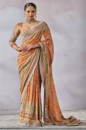 orange chinon silk saree with mirror work