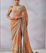 orange chinon silk saree with mirror work
