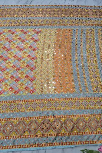 orange chinon silk saree with mirror work