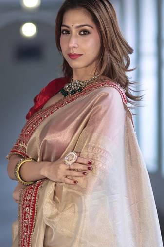 Beige Color Sequins with Jari Dori Embroidery Work Twill Net saree 