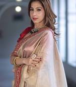 Beige Color Sequins with Jari Dori Embroidery Work Twill Net saree 