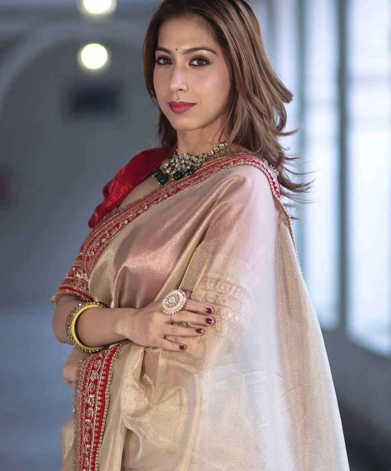 Beige Color Sequins with Jari Dori Embroidery Work Twill Net saree 