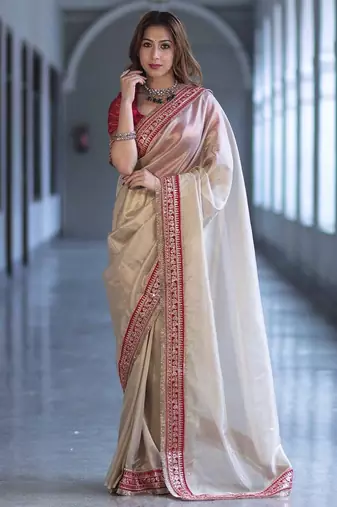 Beige Color Sequins with Jari Dori Embroidery Work Twill Net saree 