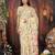 Cream linen printed saree with blouse