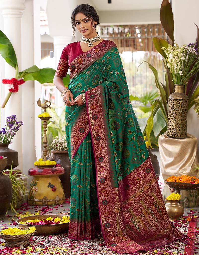 Dark green silk woven saree with blouse