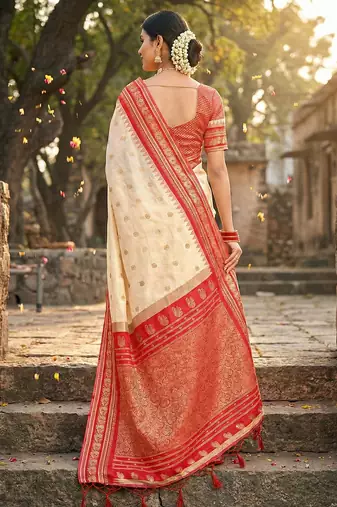 Cream silk woven saree with blouse
