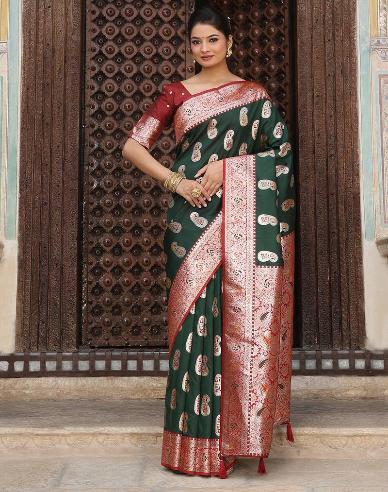 Dark green silk woven saree with blouse