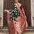 Dark green silk woven saree with blouse