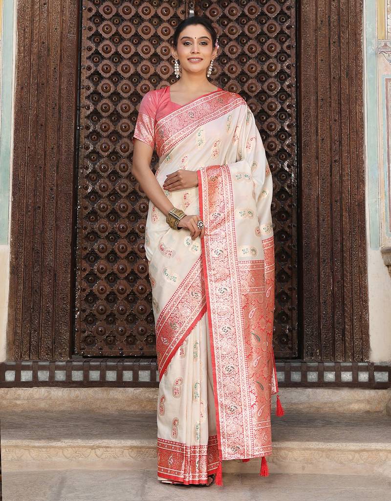 Off white silk woven saree with blouse