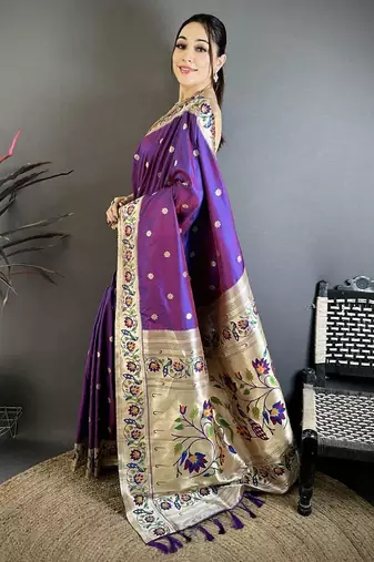 Purple color zari woven paithani silk blend saree with blouse