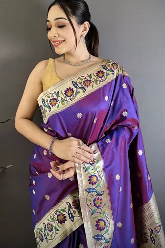 Purple color zari woven paithani silk blend saree with blouse