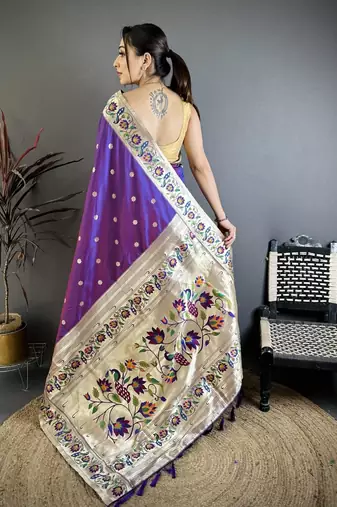 Purple color zari woven paithani silk blend saree with blouse