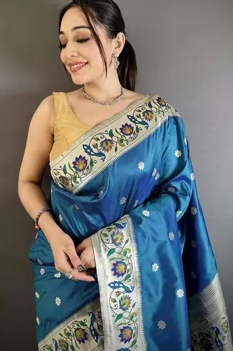 Skyblue color zari woven paithani silk blend saree with blouse