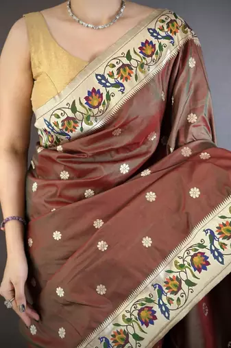 Brown color zari woven paithani silk blend saree with blouse