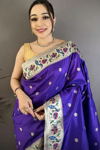 Blue color zari woven paithani silk blend saree with blouse