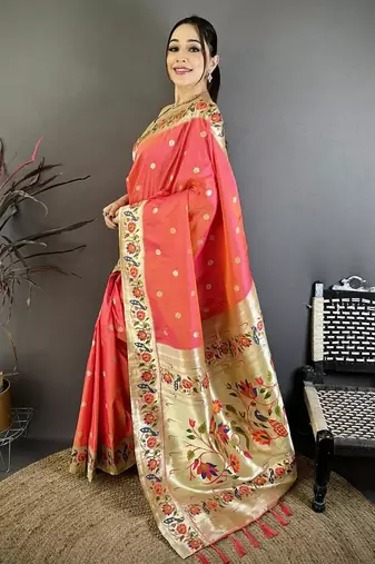 Orange color zari woven paithani silk blend saree with blouse