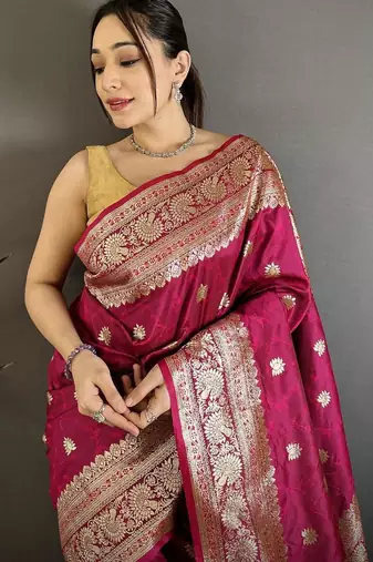 Pink color zari woven banarasi silk blend saree with blouse