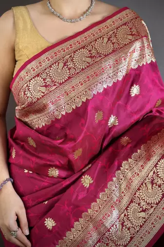 Pink color zari woven banarasi silk blend saree with blouse