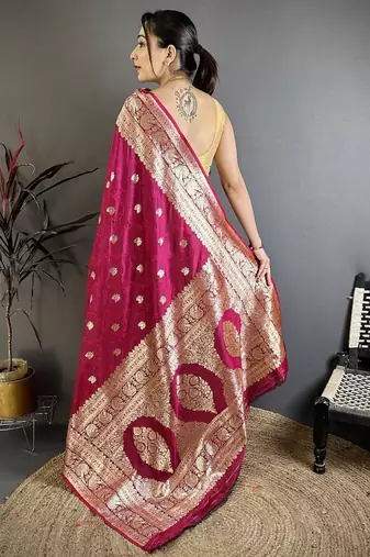 Pink color zari woven banarasi silk blend saree with blouse