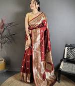 Maroon color zari woven banarasi silk blend saree with blouse