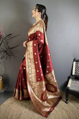 Maroon color zari woven banarasi silk blend saree with blouse