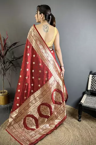 Maroon color zari woven banarasi silk blend saree with blouse