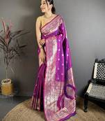 Magenta color zari woven banarasi silk blend saree with blouse