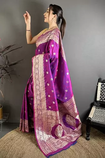 Magenta color zari woven banarasi silk blend saree with blouse