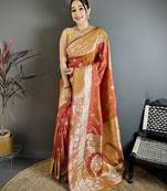 Peach color zari woven banarasi silk blend saree with blouse