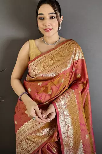 Peach color zari woven banarasi silk blend saree with blouse