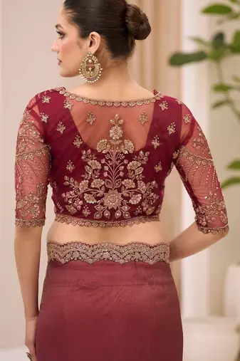 Rust georgette tissue saree with jacket style blouse