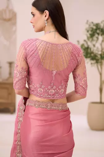 Powder pink shimmer satin saree with jacket style blouse