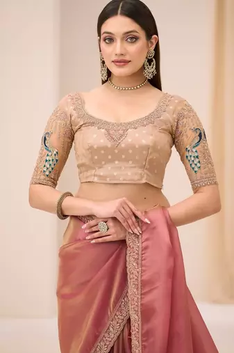 Pink tissue georgette saree with brocade zari work blouse