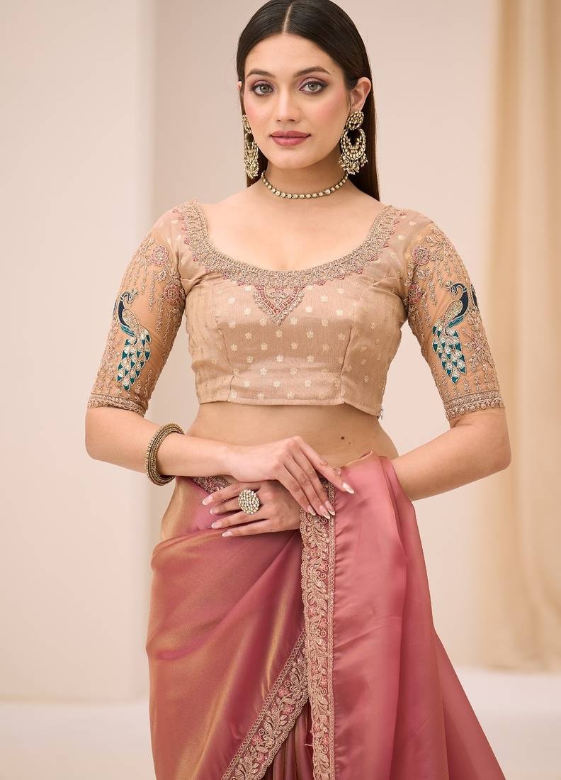 Pink tissue georgette saree with brocade zari work blouse
