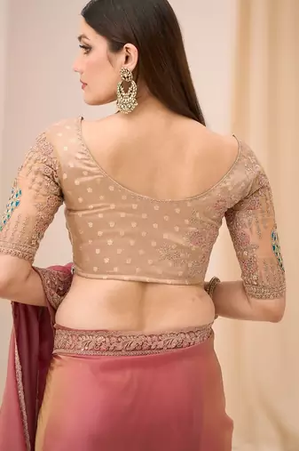Pink tissue georgette saree with brocade zari work blouse