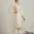 white embroidered style suit