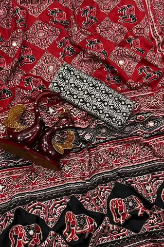Black Color Zari and mirror work crepe silk Saree