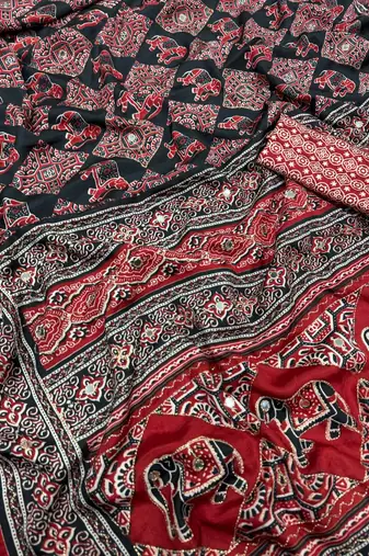 Red Color Zari and mirror work crepe silk Saree