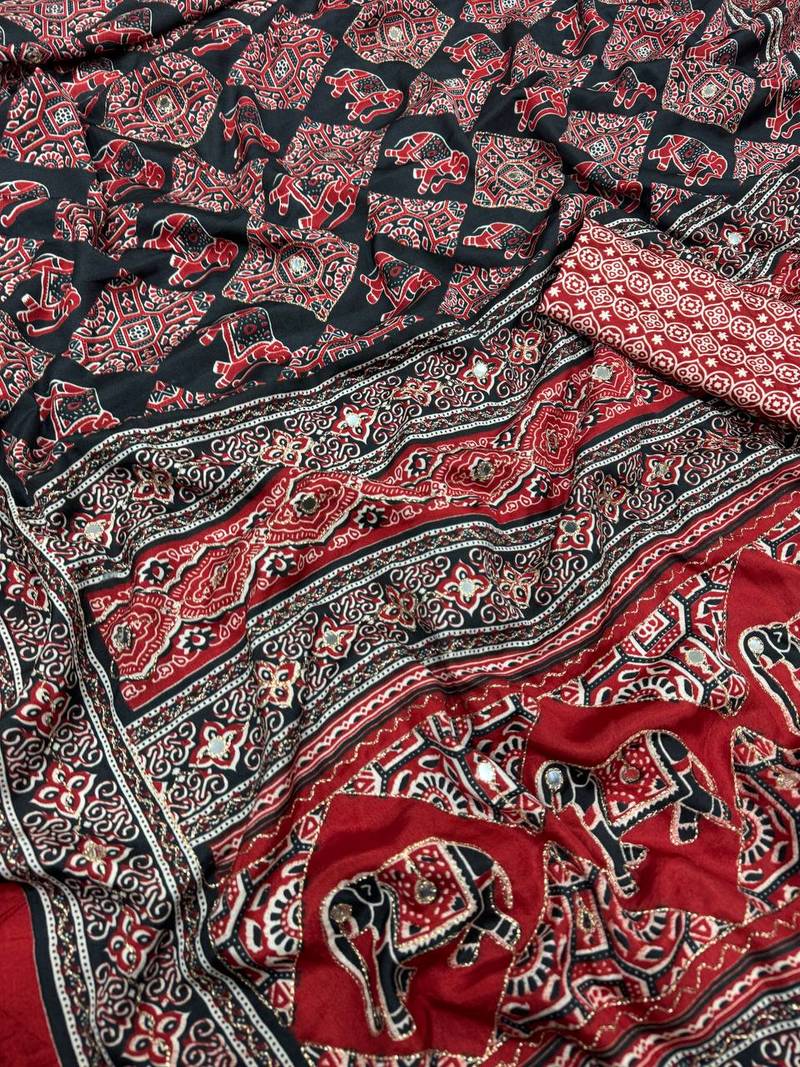 Red Color Zari and mirror work crepe silk Saree