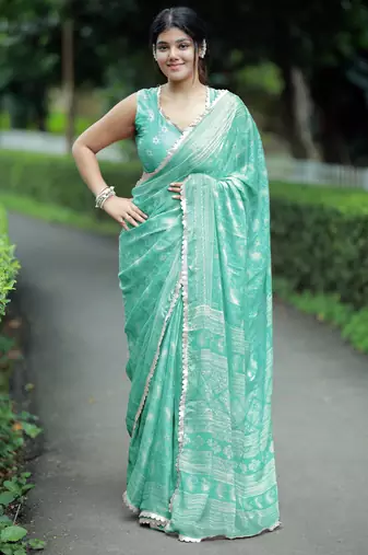 Mirchi fashion paisle print chiffon saree with unstitched blouse piece (turquoise)