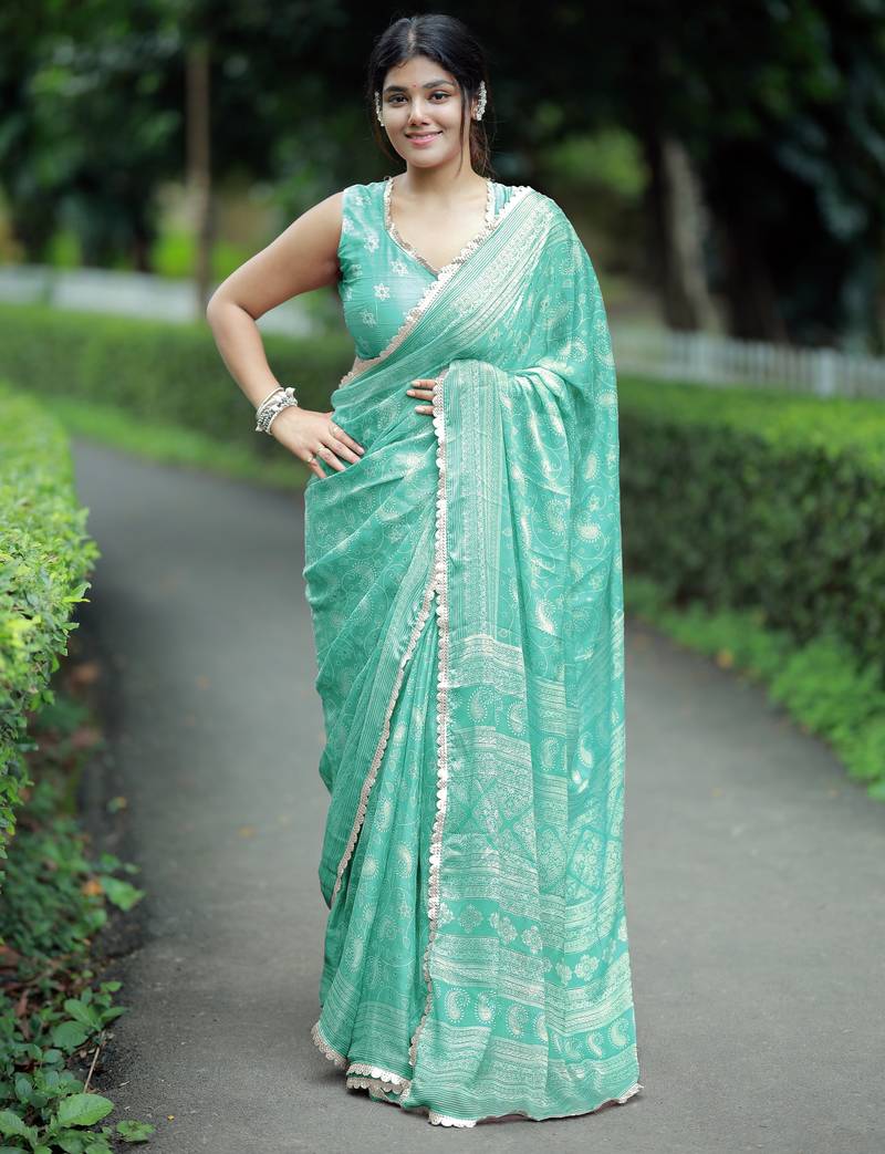 Mirchi fashion paisle print chiffon saree with unstitched blouse piece (turquoise)