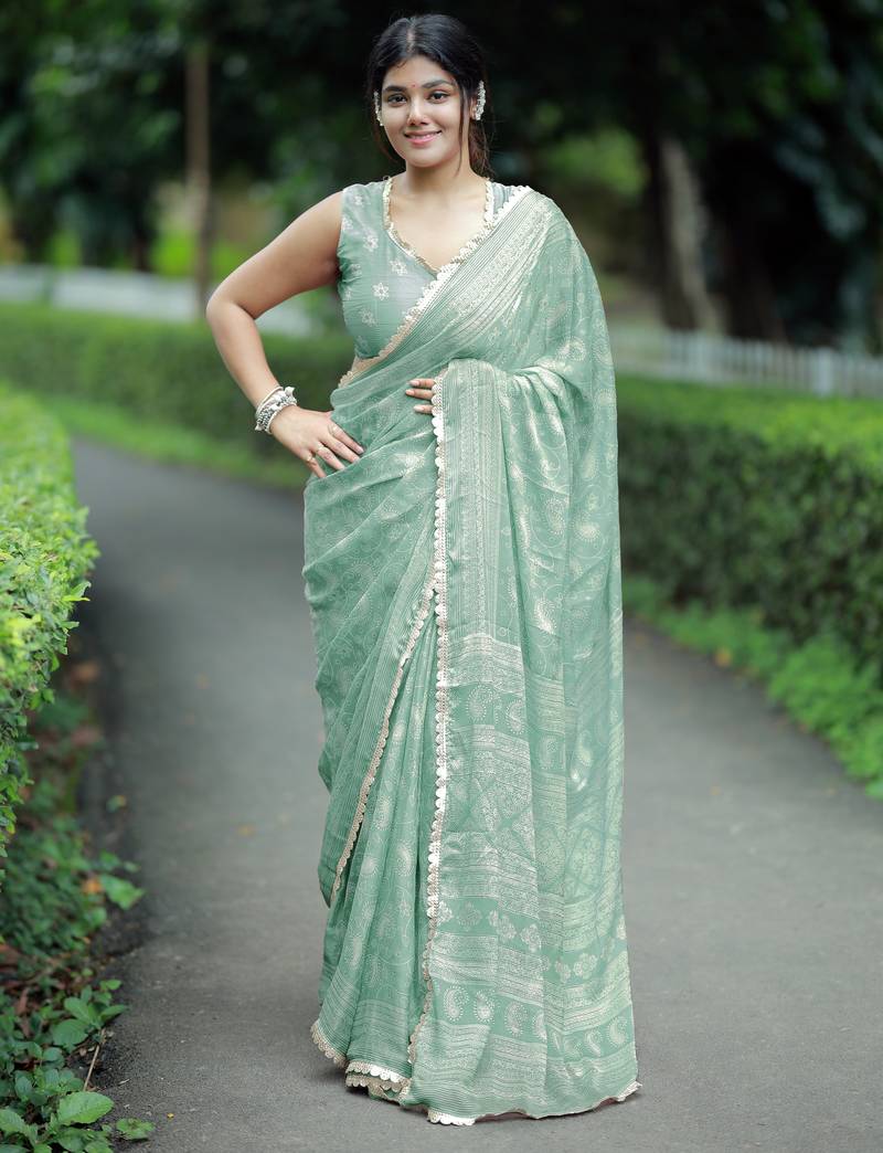 Mirchi fashion paisle print chiffon saree with unstitched blouse piece (teal)
