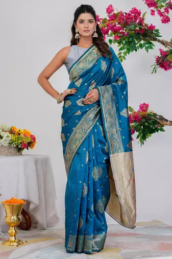 Subham woven design silk blend saree with unstitched blouse piece (turquoise)