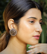 Dual-tone circular stud earrings