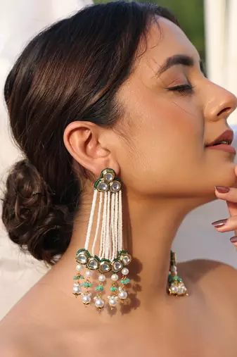 Mriga green kundan pearl earrings