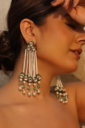 Mriga green kundan pearl earrings